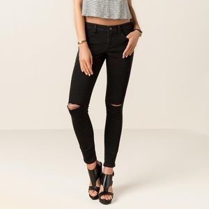 Francesca’s Harper Black Knee Slit Skinny Jeans